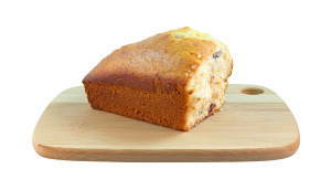 Cranberry Loaf On A Wood Cutting Board Side View